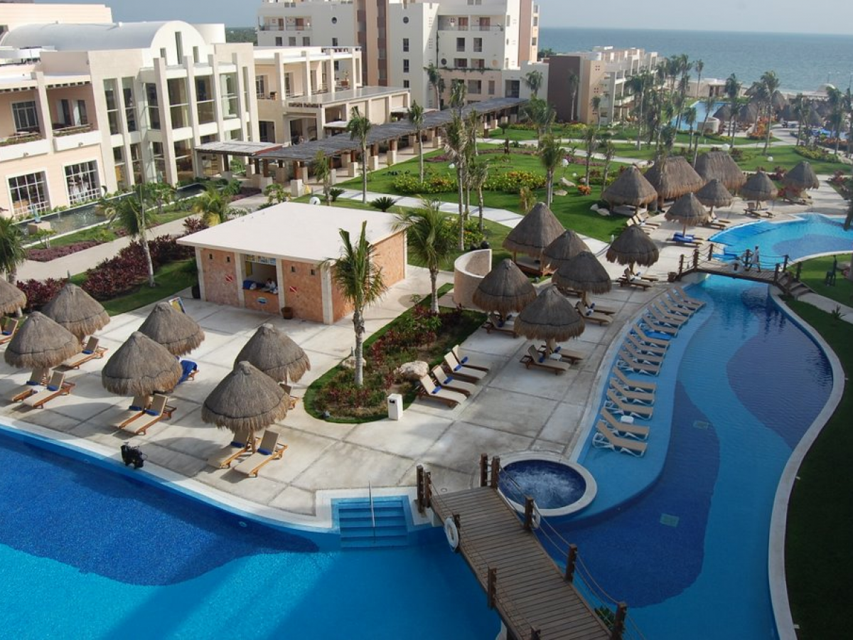 Excellence Playa Mujeres adults-only all-inclusive resort with beachfront suites and lagoon-style pools near Cancun.