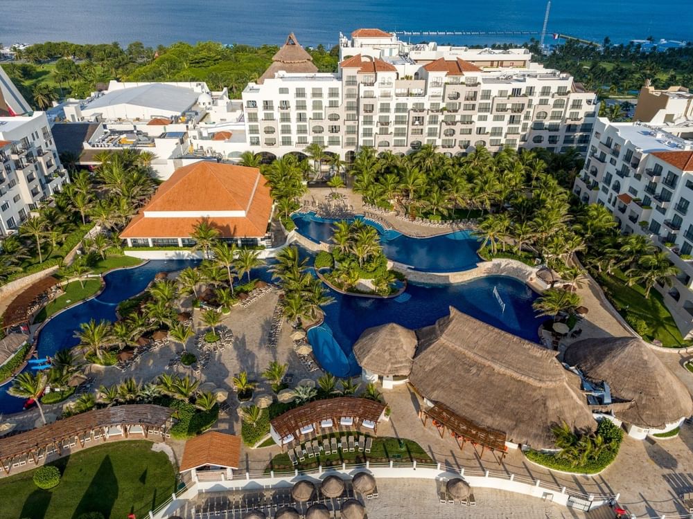 Fiesta Americana Condesa Cancun all-inclusive resort with beachfront pools and tropical landscaping in Cancun Hotel Zone.