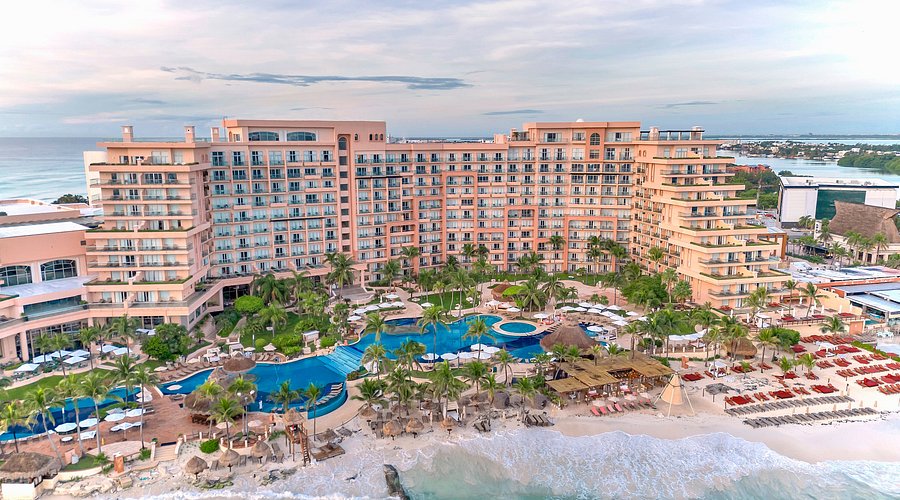 Grand Fiesta Americana Coral Beach Cancun luxury beachfront resort with pools and Caribbean Sea views.