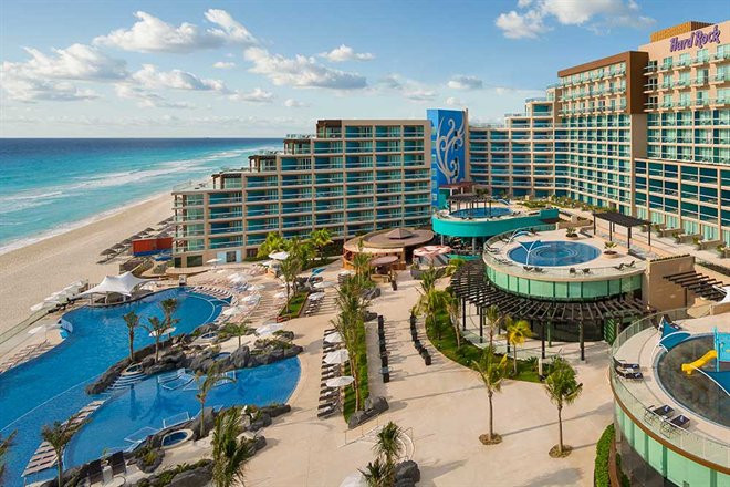 Hard Rock Hotel Cancun all-inclusive beachfront resort with lively pool atmosphere and entertainment.