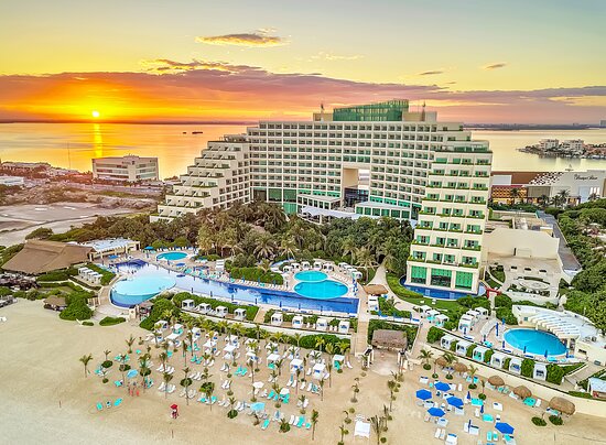 Live Aqua Beach Resort Cancun adults-only luxury resort with modern pools and oceanfront setting.