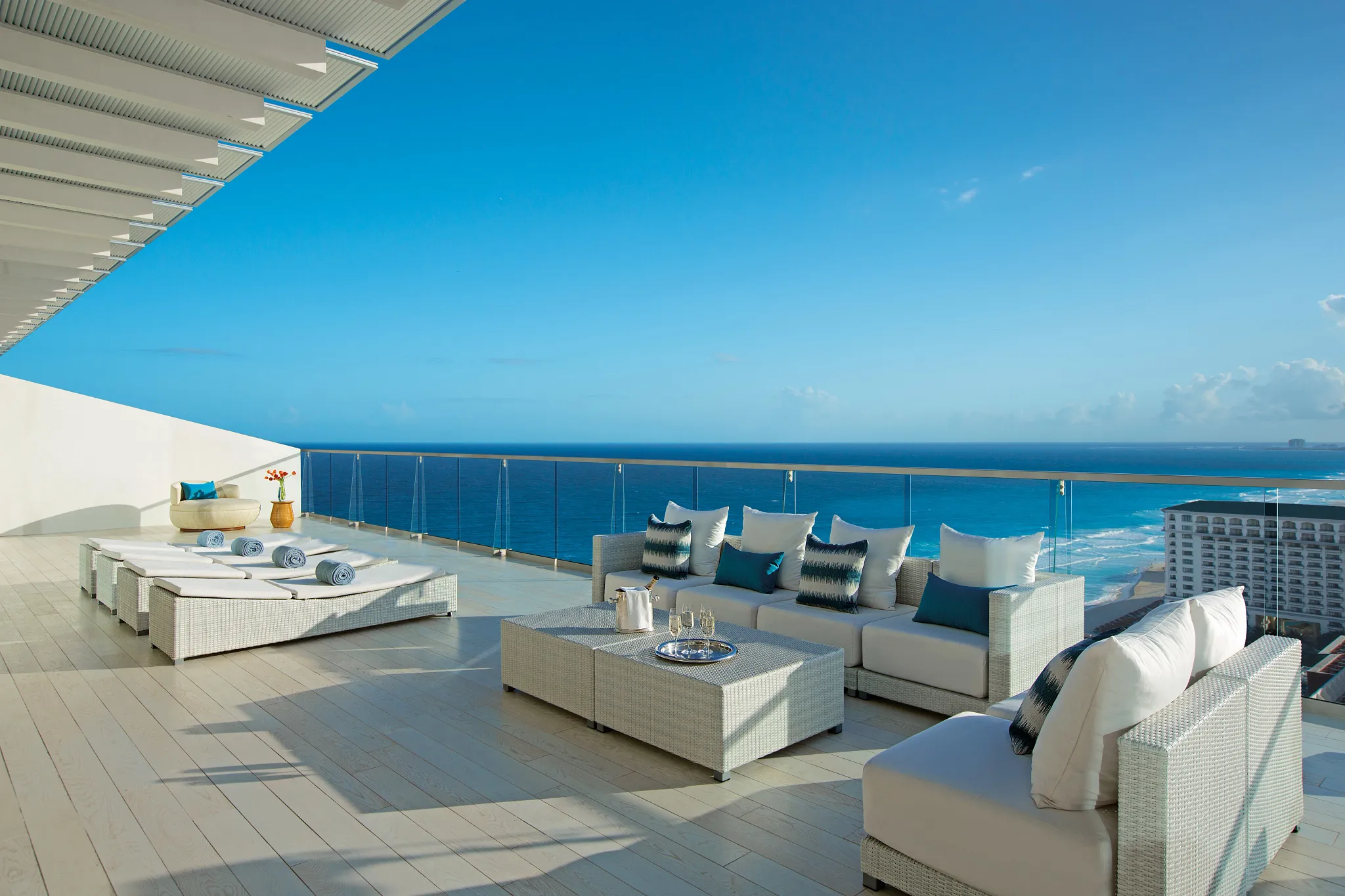 Preferred Club Presidential Suite private terrace with lounge seating and ocean views in Cancun.