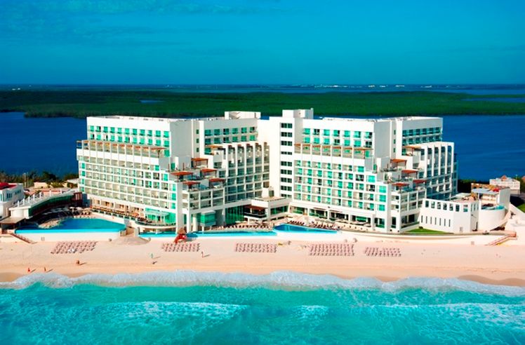 Sun Palace Cancun adults-only all-inclusive resort with beachfront infinity pool and ocean views.